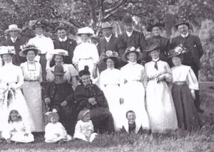 Duncan (right back row) and wife, Josephine (second from right front row) at a country wedding at Leeston, Canterbury, New Zealand, 1909