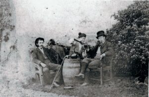 Robert McCallum (right) at Fendoch Farm, Crieff, Perthshire, c1881 drinking whisky with some friends.