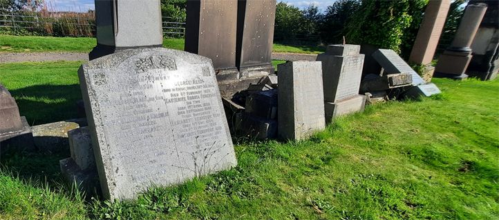 Monuments requiring re-erection in compartment Sigma - some gravestones are lying their base