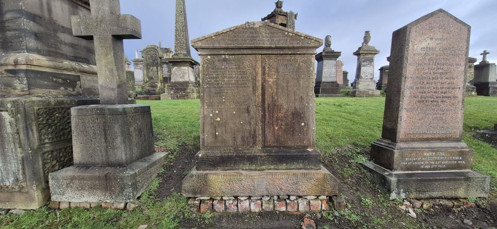 The stone of Robert Black, architect has been re-erected