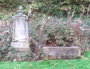 The stone base of the MacKenzie monument (right) after the rest of the monument was removed for restoration in 2018. The base itself would be cleaned for the monument’s reinstatement in 2025.