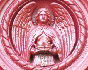 The same detail restored and painted red