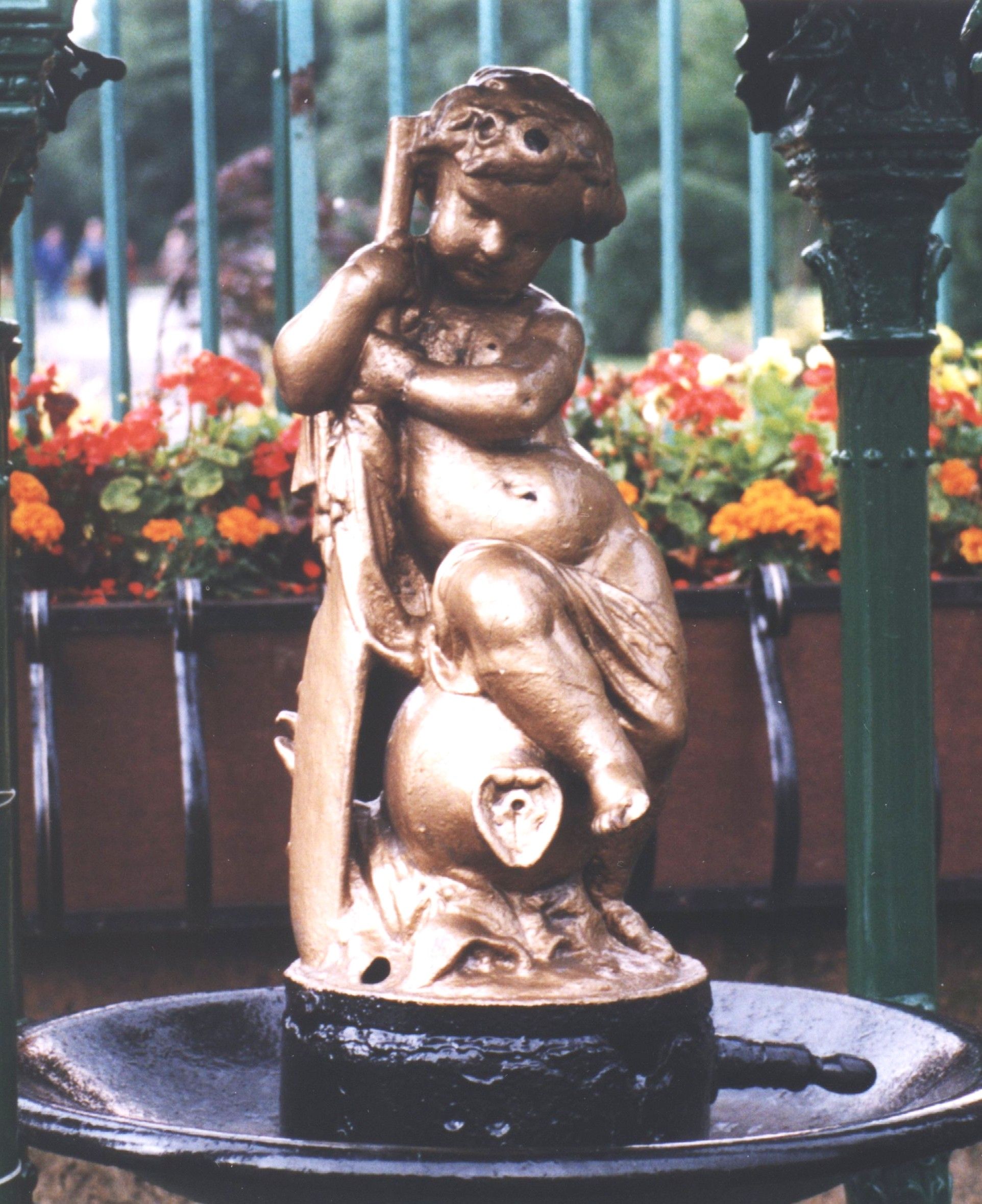 The Sun Foundry drinking fountain outside Alexandra Park, Glasgow, c. 1870s. The fountain’s Boy with Paddle sculpture